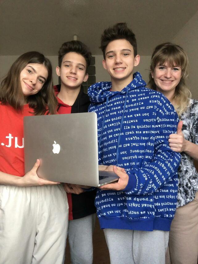 Ukrainian Children Receiving Laptop Donation From Vendavo Corporate Giving Program
