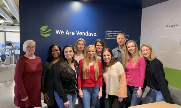 Vendavo Team Members Working Together in an Office Setting